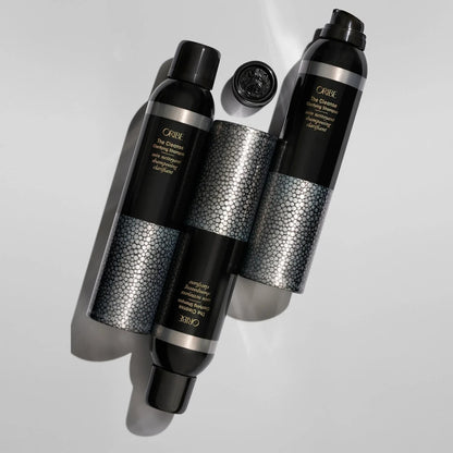 Shop Rescue Spa Oribe The Cleanse Clarifying Shampoo bottles with textured silver bands and black caps.