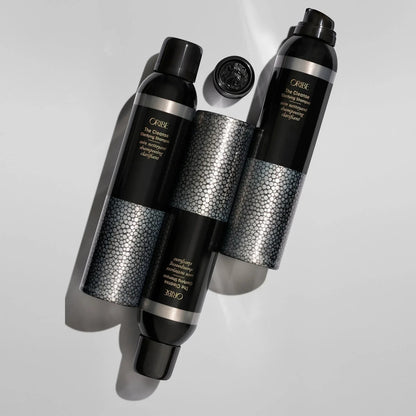 Shop Rescue Spa Oribe The Cleanse Clarifying Shampoo bottles with textured silver bands and black caps.
