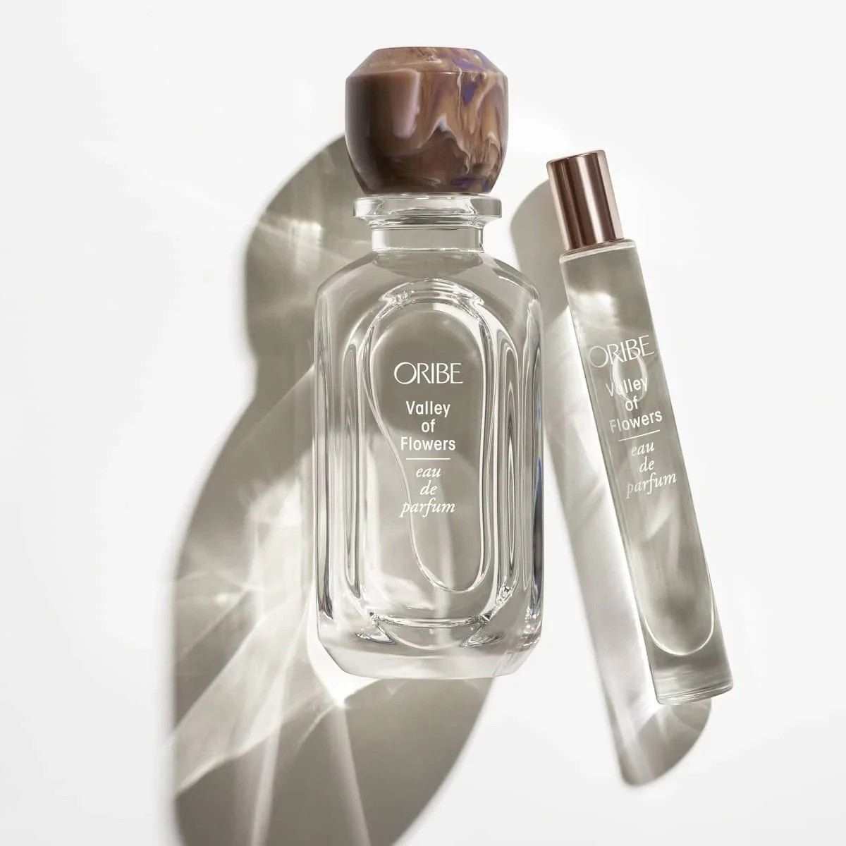 Shop Rescue Spa ORIBE Valley of Flowers Eau de Parfum with rose, jasmine, peony, amber, woods, and musk notes. Includes full size and travel size bottles.