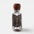 Shop Rescue Spa Oribe Valley of Flowers eau de parfum in a glass bottle with a decorative brown marbled cap.