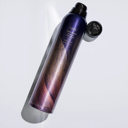 Shop Rescue Spa Oribe Apres Beach Wave and Shine Spray in a dark purple metallic aerosol bottle with a black cap.