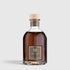 Shop Rescue Spa Oud Nobile room diffuser in a glass bottle with a wooden cap, featuring smoky oud and bergamot notes.