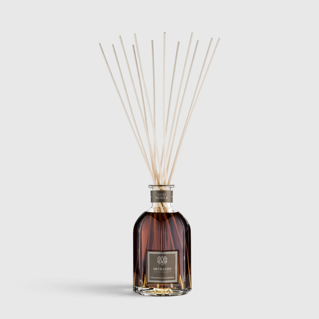 Shop Rescue Spa Oud Nobile room diffuser in a glass bottle with reed sticks for a smoky, woody home fragrance.