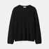 Shop Rescue Spa oversized black cable knit sweater made from 100% cashmere with a relaxed fit and crew neckline.
