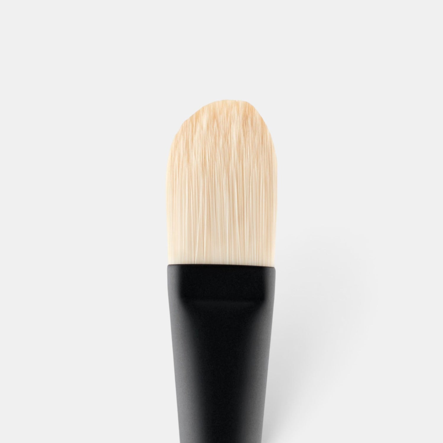 Shop Rescue Spa paddle foundation brush with soft, tapered cruelty-free nylon bristles and a black lacquered handle.