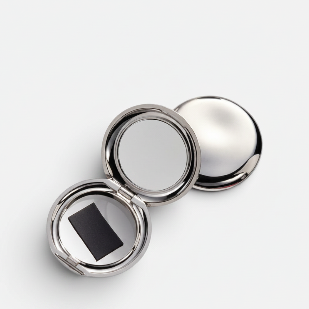 Shop Rescue Spa Pebble Compact in a chic, silver, wave-inspired design with an interior mirror for makeup application.