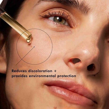 Shop Rescue Spa Phloretin CF vitamin C serum being applied to a woman&