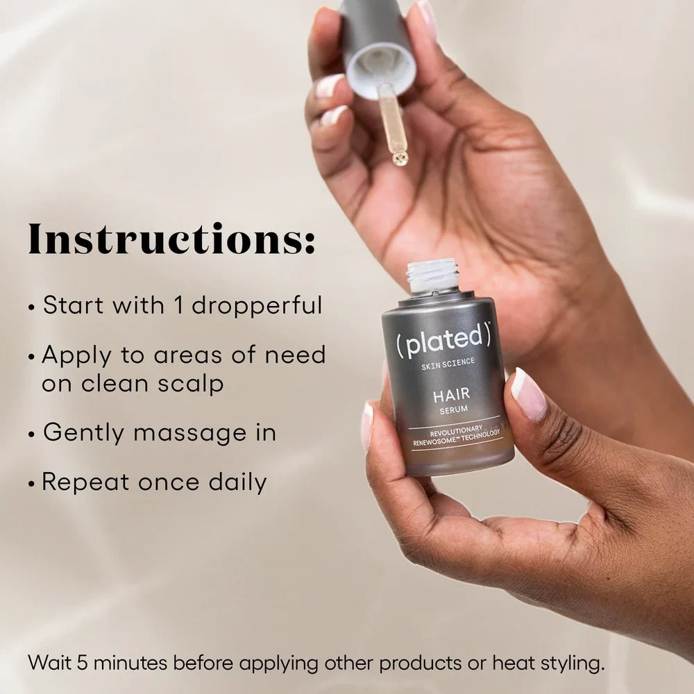 Shop Rescue Spa Plated Skin Science hair serum bottle with dropper held by a person, showing application instructions.