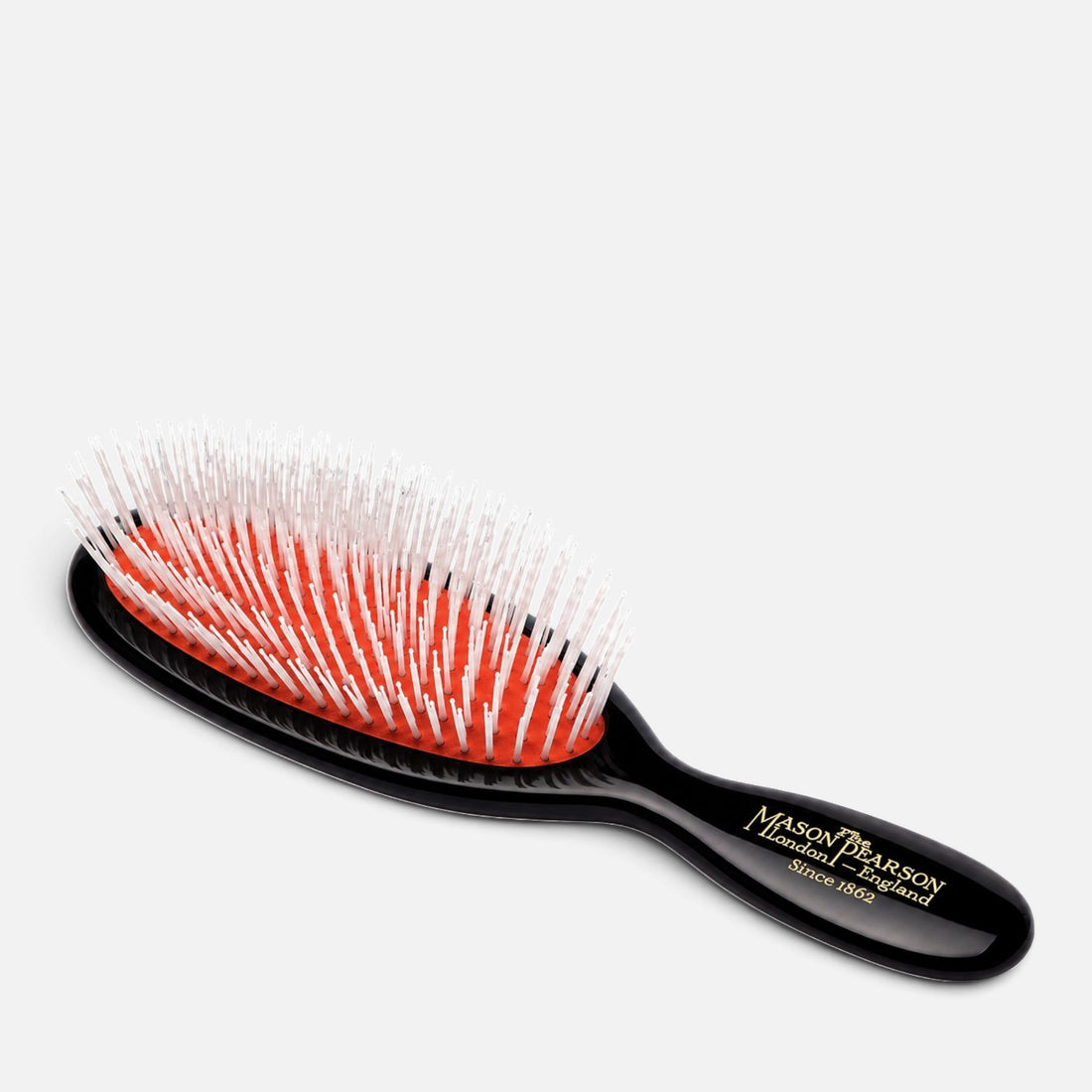 Shop Rescue Spa Pocket Nylon Brush N4 with a black cellulose acetate handle and a vibrant orange rubber cushion.