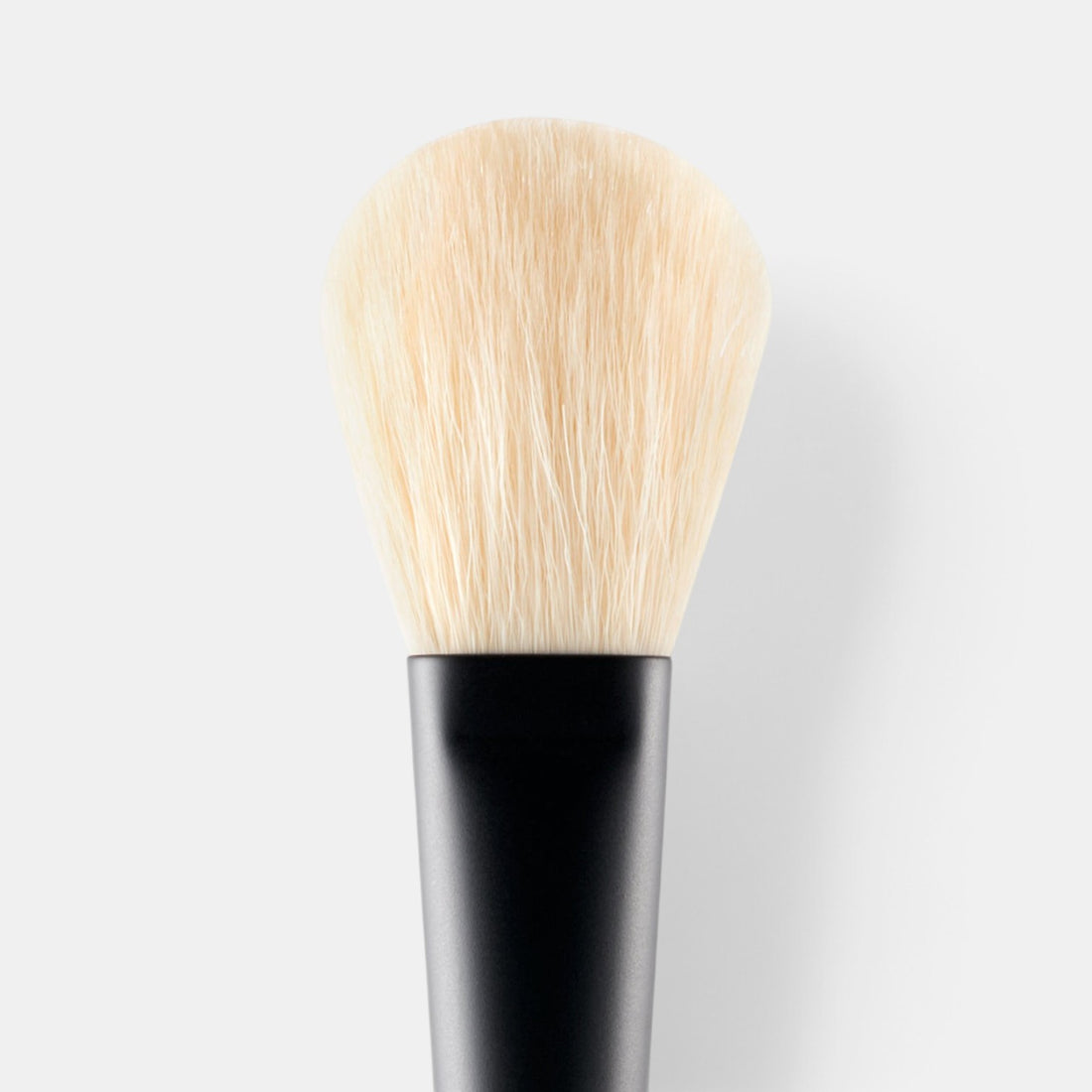 Shop Rescue Spa powder brush with soft, dense, cruelty-free nylon bristles and a sleek black lacquered hardwood handle.