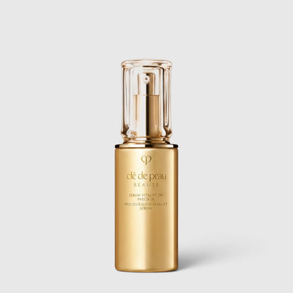 Shop Rescue Spa Precious Gold Vitality Serum in a luxurious gold bottle with a clear pump cap for anti-aging care.