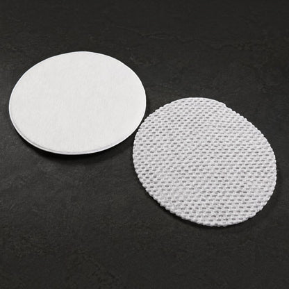 Shop Rescue Spa premium cotton rounds featuring a smooth side and a removable textured gauze layer for exfoliation.