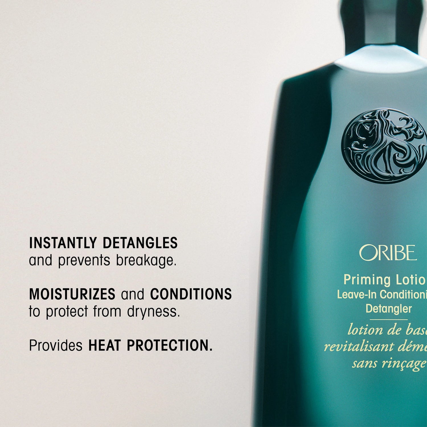 Oribe Priming Lotion Leave-In Conditioning Detangler bottle, teal with gold lettering, detangles and moisturizes hair.
