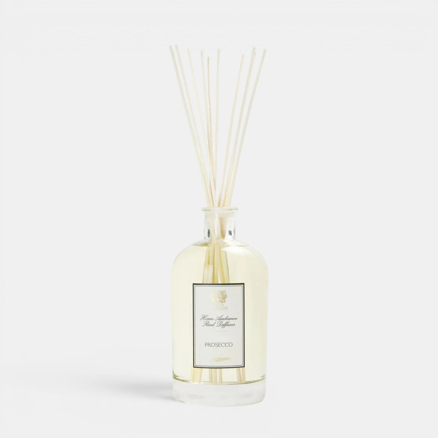 Shop Rescue Spa Prosecco reed diffuser in a clear glass bottle with light citrus and floral home fragrance oil