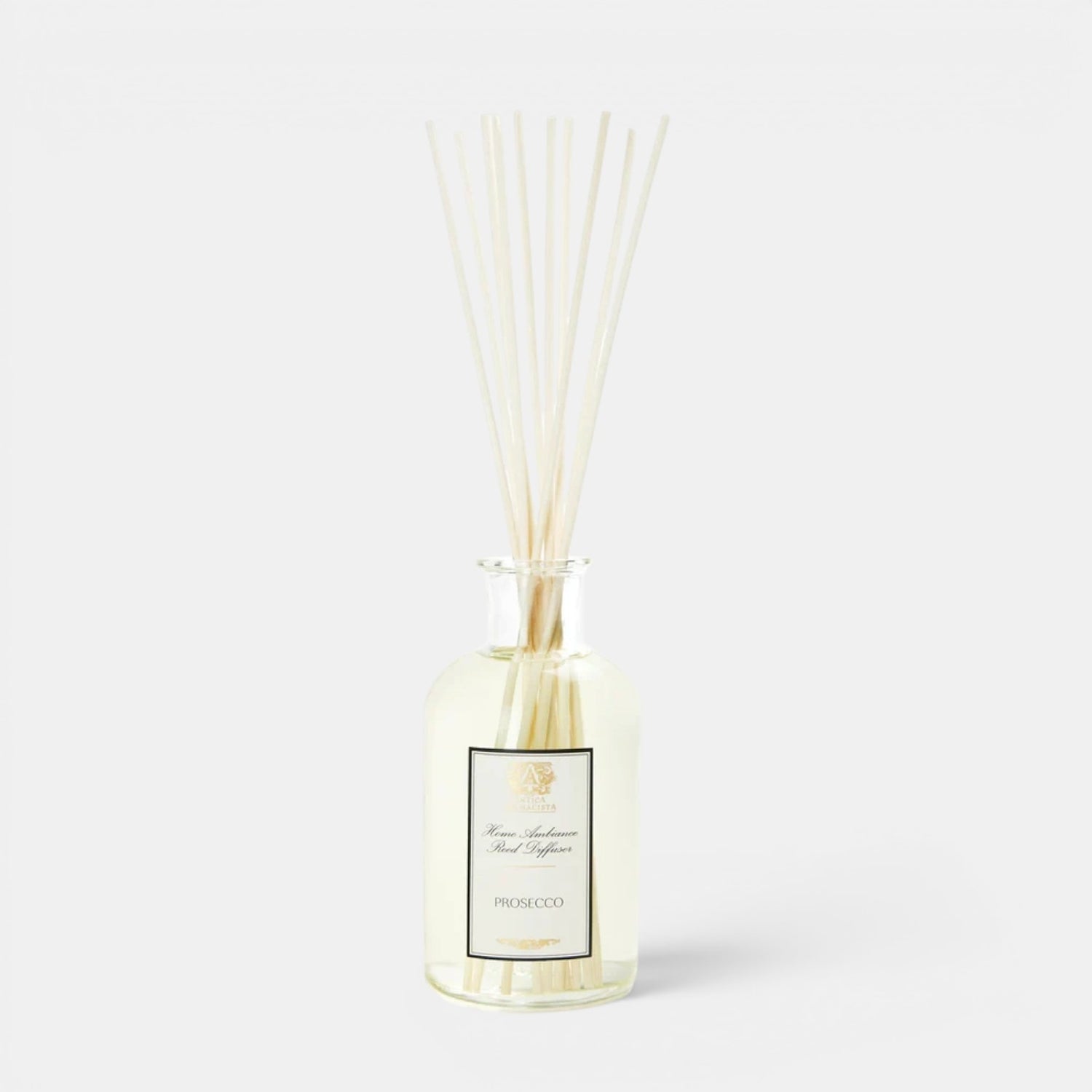 Shop Rescue Spa Prosecco reed diffuser in a clear glass bottle with white rattan reeds for home fragrance