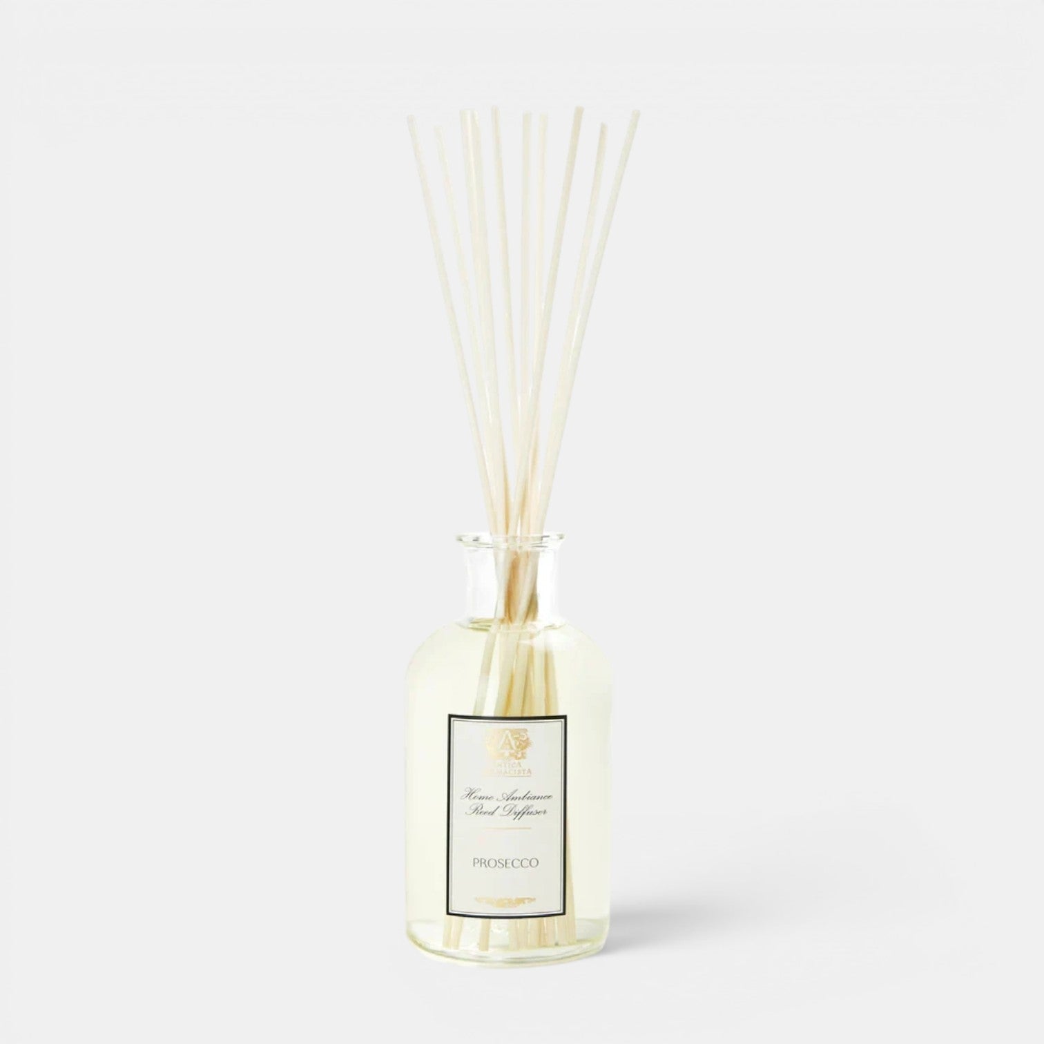 Shop Rescue Spa Prosecco reed diffuser in a clear glass bottle with white rattan reeds for home fragrance