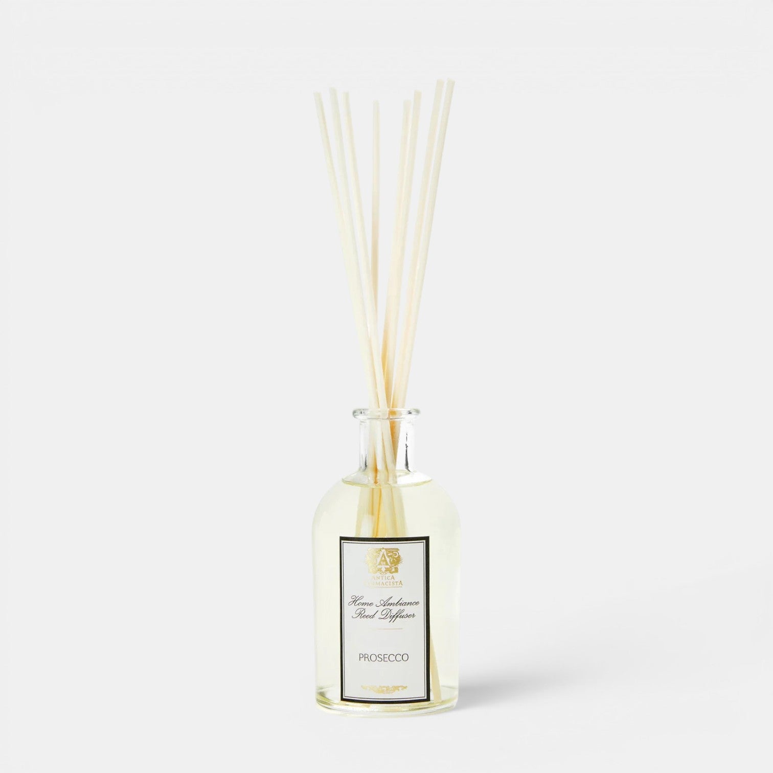 Shop Rescue Spa Prosecco reed diffuser in a clear glass bottle with white reeds for home fragrance.