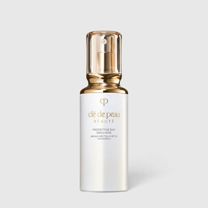 Shop Rescue Spa Cle de Peau Beaute Protective Day Emulsion SPF 25 in a white pump bottle with a gold cap.
