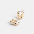 Shop Rescue Spa puffy gold U-link hoop earrings with a high-polish finish and convenient hinged closure.