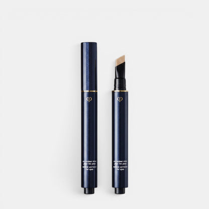 Shop Rescue Spa Radiant Corrector For Eyes dark navy pen with gold accent, brush applicator, and skincare formula for bright eyes.