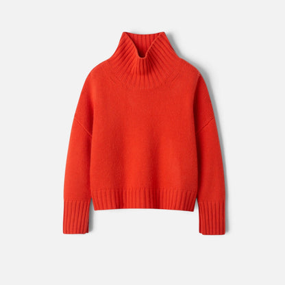 Shop Rescue Spa Girlfriend turtleneck sweater in bright red chunky knit cashmere with sleeve slits