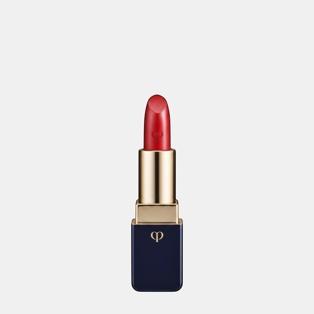 Shop Rescue Spa luxurious satin red lipstick with a gold and navy case, infused with argan oil for nourished lips.