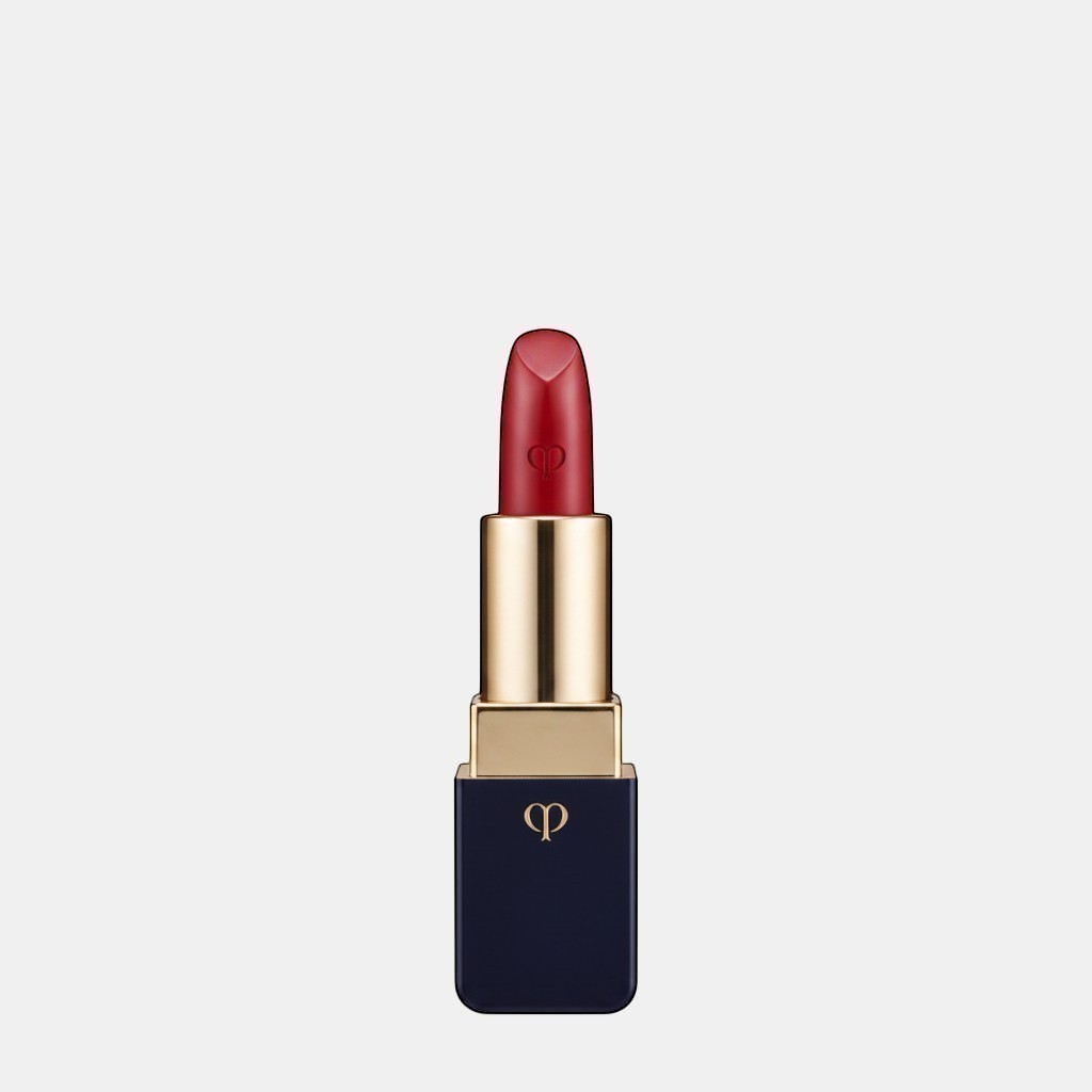 Shop Rescue Spa luxurious satin lipstick in a vibrant red shade with a lustrous finish and gold accents.