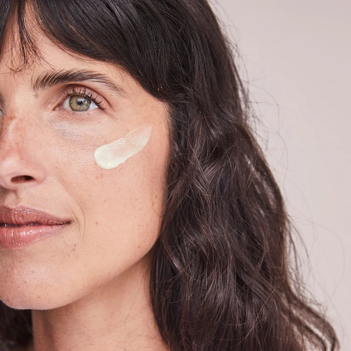 Shop Rescue Spa Renewal Retinol 0.5 serum applied as a cream dab on a woman&