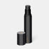 Shop Rescue Spa The Reparative Moisturizer in a sleek black hexagonal pump bottle with its cap removed.