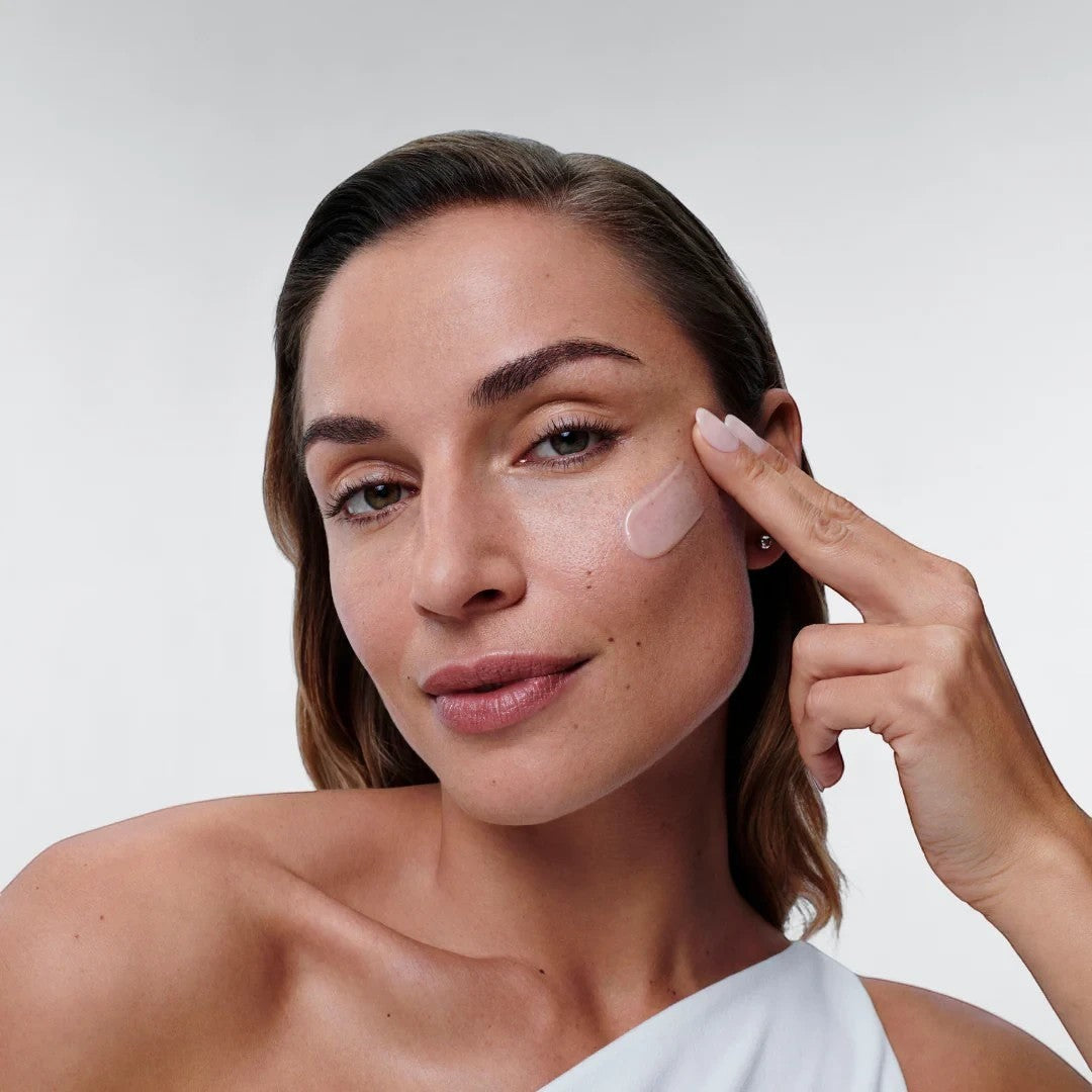 Shop Rescue Spa Restorative Skin Complex peptide serum applied to a woman&