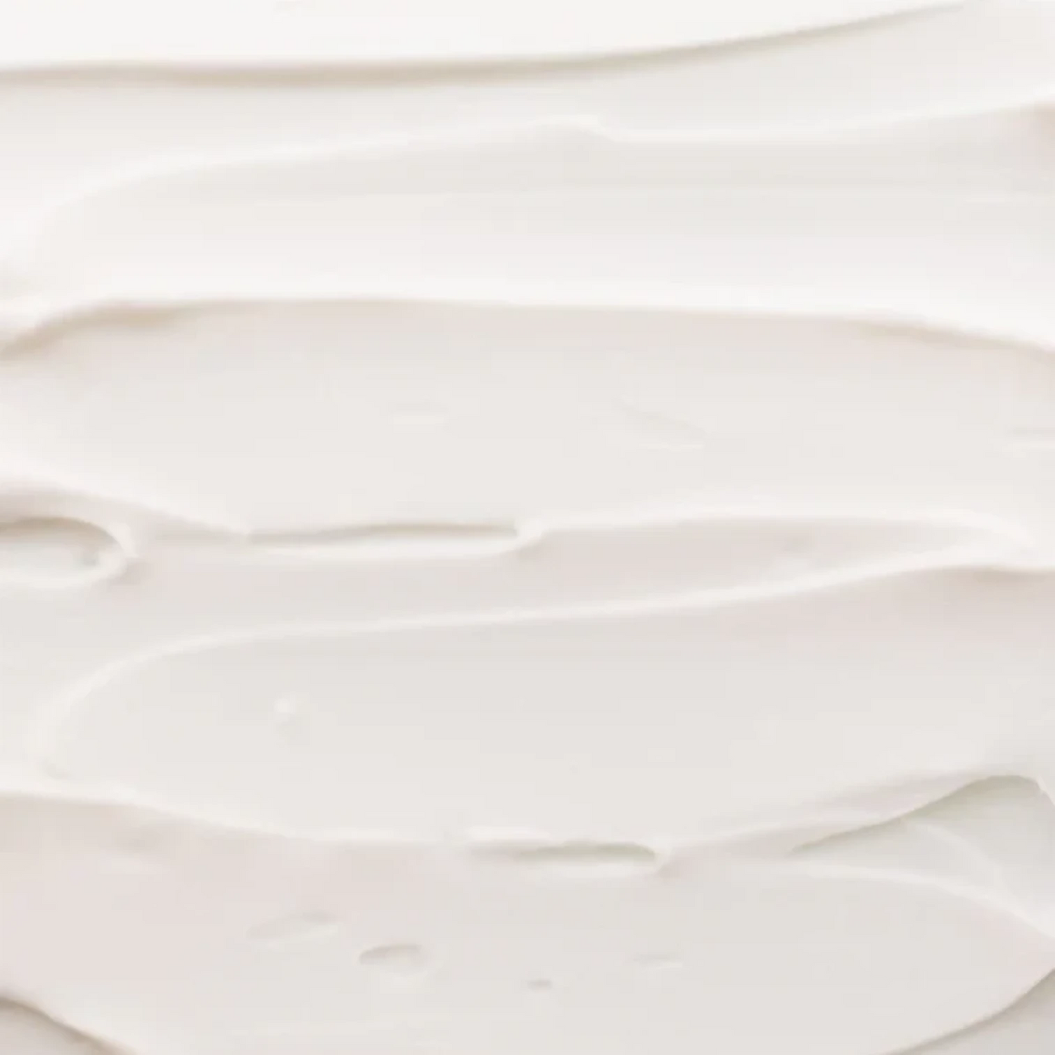Shop Rescue Spa Rich Hand Cream texture showing a smooth, thick white moisturizing cream spread in soft swirls.