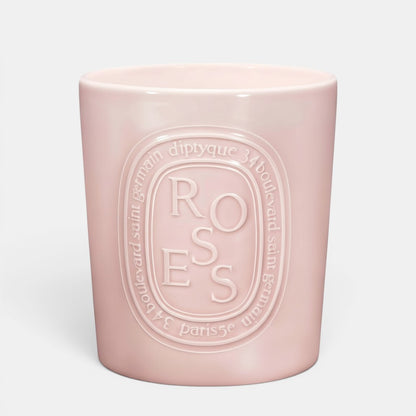 Shop Rescue Spa Roses scented candle in a pale pink ceramic vessel with embossed floral branding