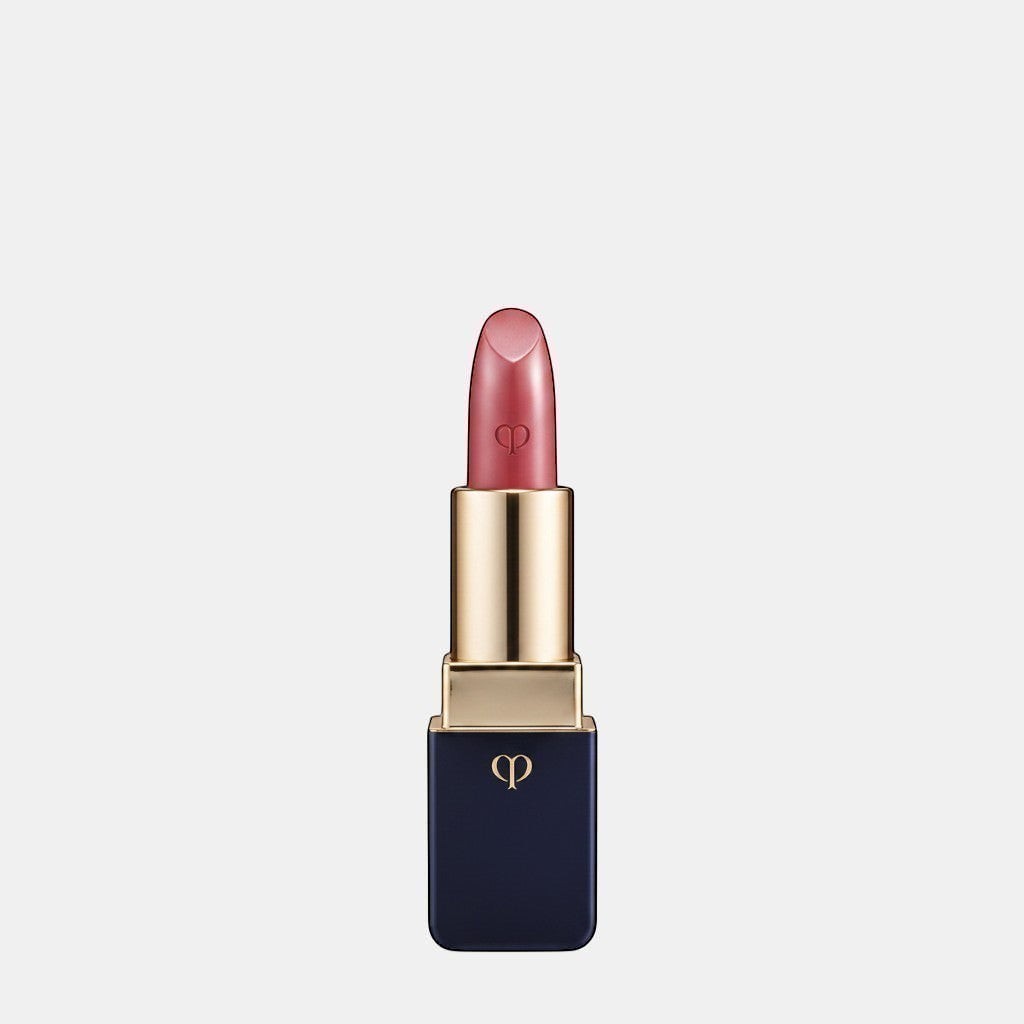 Shop Rescue Spa luxurious satin lipstick in a rosy pink shade with a lustrous finish and gold accents.