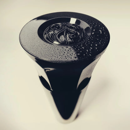 Shop Rescue Spa Royal Blowout Heat Styling Spray bottle cap with water droplets on a sleek black surface