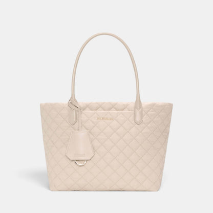 Shop Rescue Spa Sand Small Daily Tote in quilted beige nylon with Italian leather handles and light gold hardware.