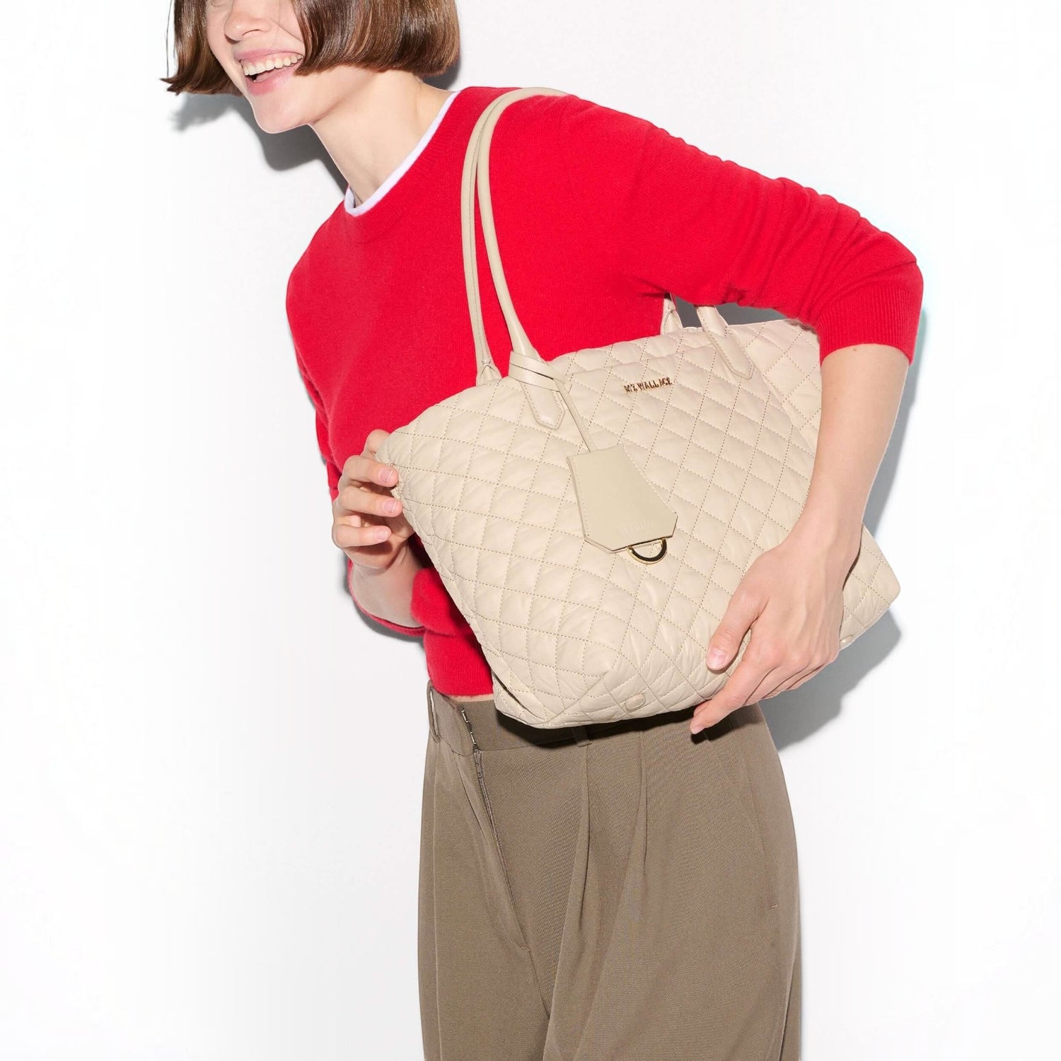 Shop Rescue Spa Sand Small Daily Tote in quilted beige nylon with Italian leather handles and gold hardware
