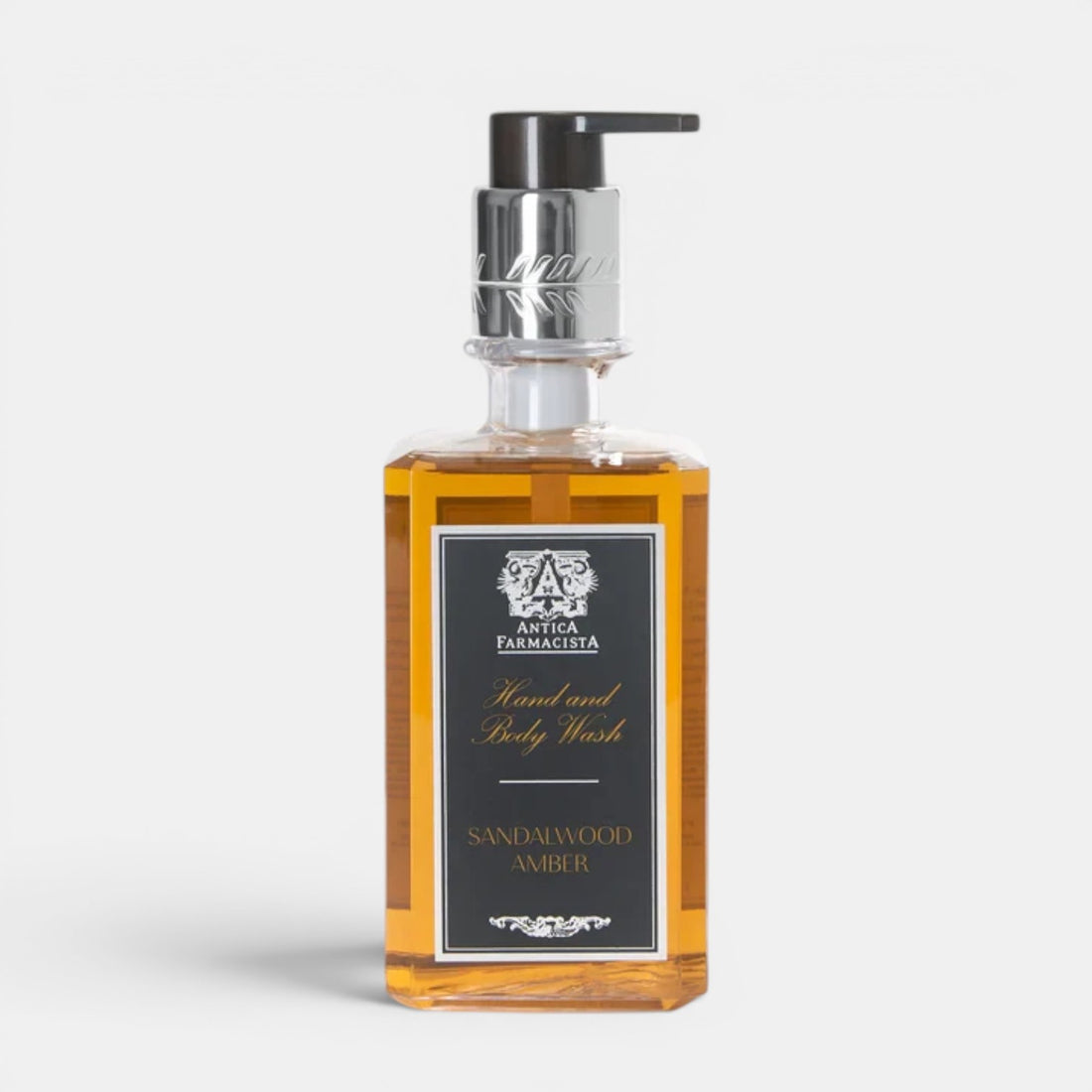 Shop Rescue Spa Antica Farmacista Sandalwood Amber hand and body wash in a clear bottle with a silver pump dispenser.
