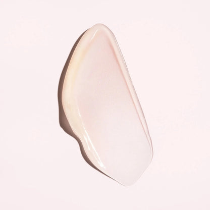 Shop Rescue Spa Serene Scalp Soothing Leave-On Treatment swatch, a light pink, creamy texture on a pale pink background.