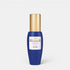Shop Rescue Spa Serum Grand Millesime youth-enhancing face serum in a blue glass bottle with a gold cap.