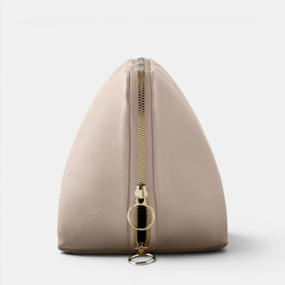 Shop Rescue Spa Signature Makeup Bag in beige leather with gold zipper. Ideal for travel and beauty collections.