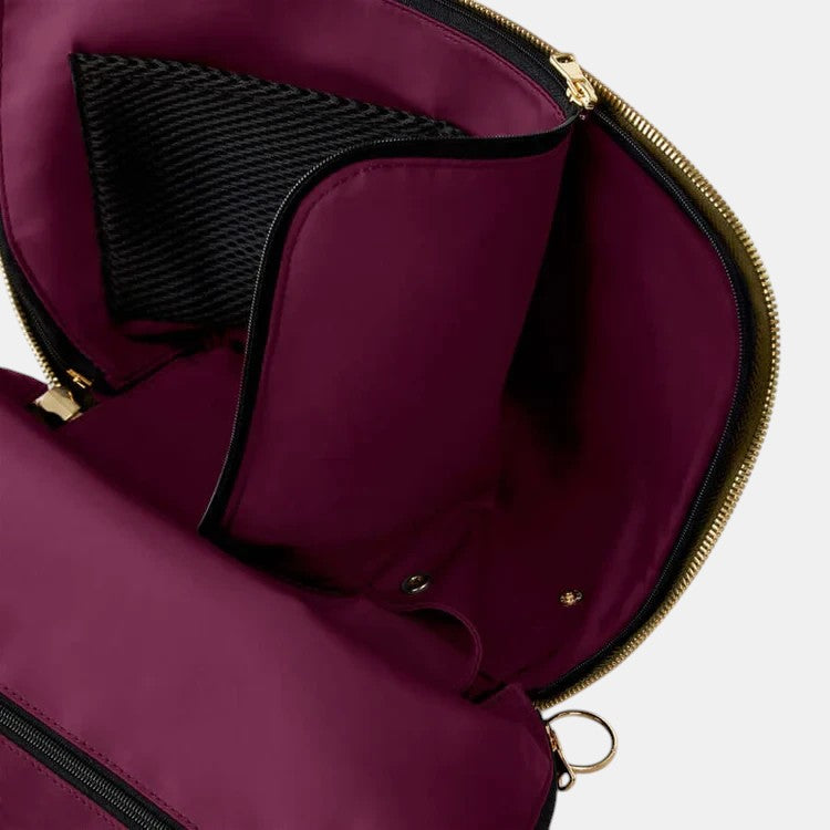 Shop Rescue Spa Signature Leather Makeup Bag with burgundy lining and mesh pocket. Opens on three sides for easy access.