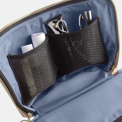 Shop Rescue Spa Signature Leather Makeup Bag with interior mesh pockets holding cosmetics and toiletries.