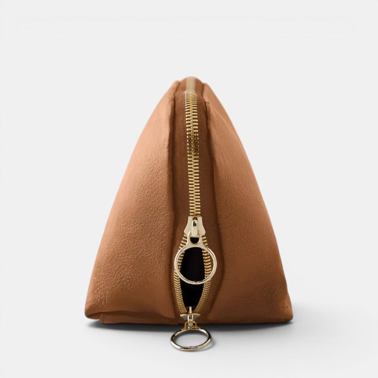 Shop Rescue Spa Signature Leather Makeup Bag in tan with gold zipper, ideal for travel and beauty collections.