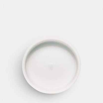 Shop Rescue Spa Silver Mountain Water candle in a minimalist white ceramic jar, top-down view.