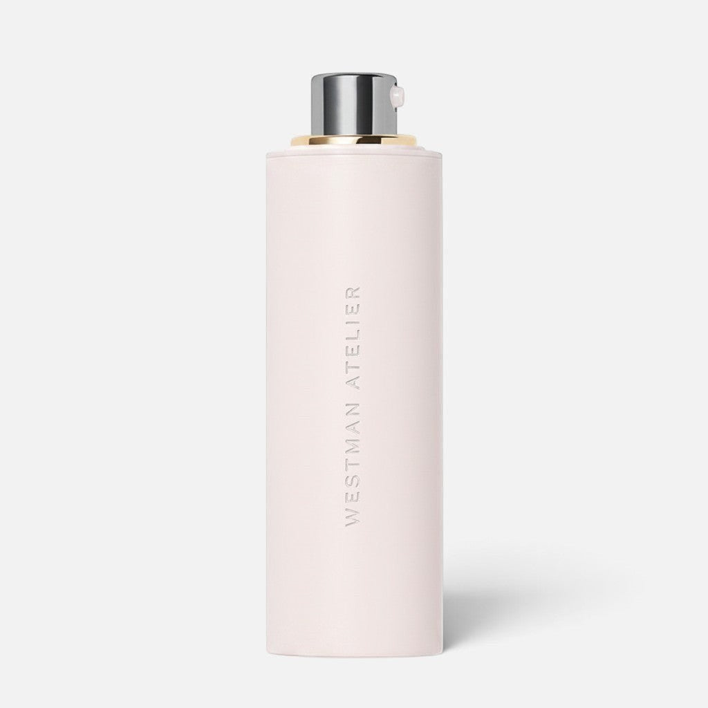 Shop Rescue Spa Skin Activator Serum in a pale pink cylindrical bottle with a silver and gold pump dispenser