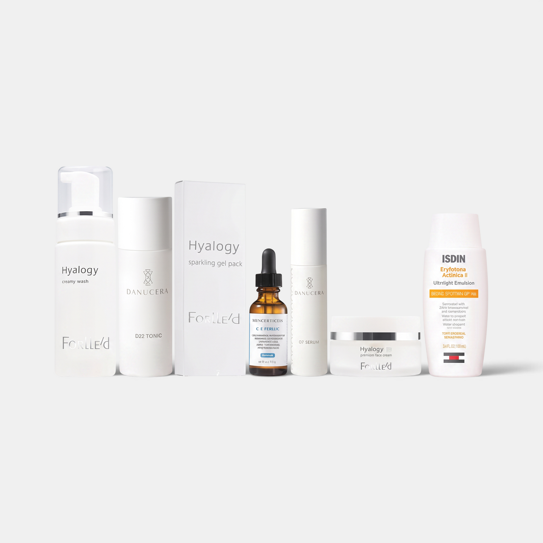 Shop Rescue Spa The Radiant Glow skincare set featuring cleansers, serums, toners, and creams for a complete routine.
