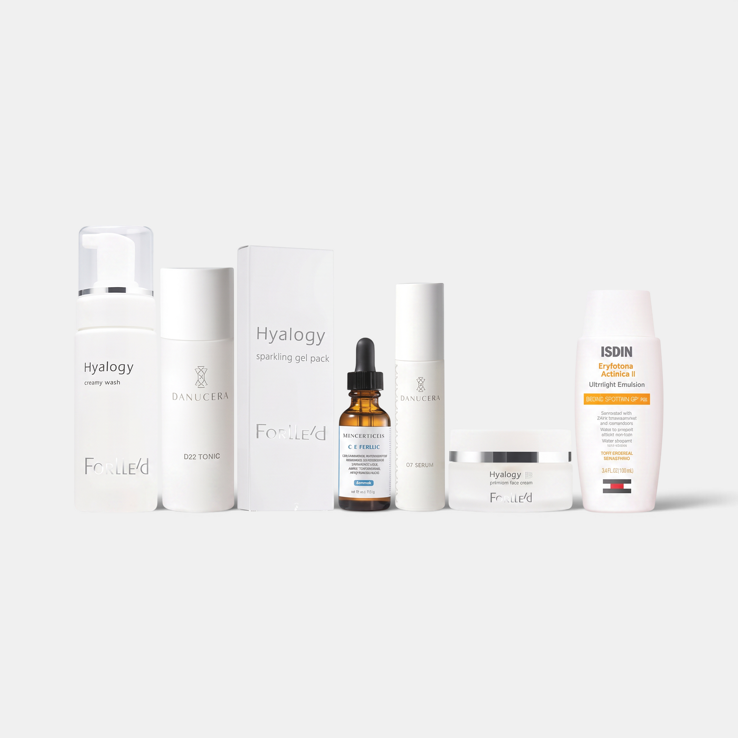 Shop Rescue Spa The Radiant Glow skincare set featuring cleansers, serums, toners, and creams for a complete routine.