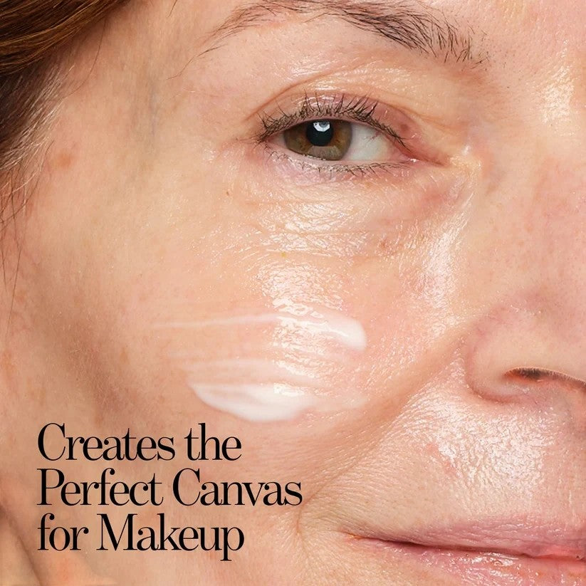 Shop Rescue Spa Ultra Sun Protection SPF 45 primer applied as a smooth white cream on a woman&