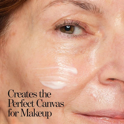 Shop Rescue Spa Ultra Sun Protection SPF 45 primer applied as a smooth white cream on a woman&