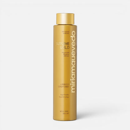 Shop Rescue Spa Sublime Gold Luminous Conditioner in a gold bottle for anti-aging and hair hydration.